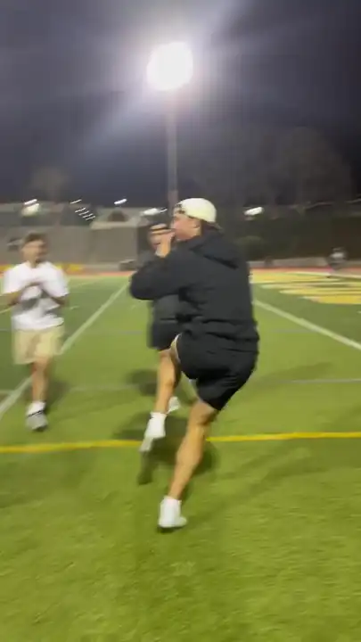 Bad quarterback throws football into receiver's balls